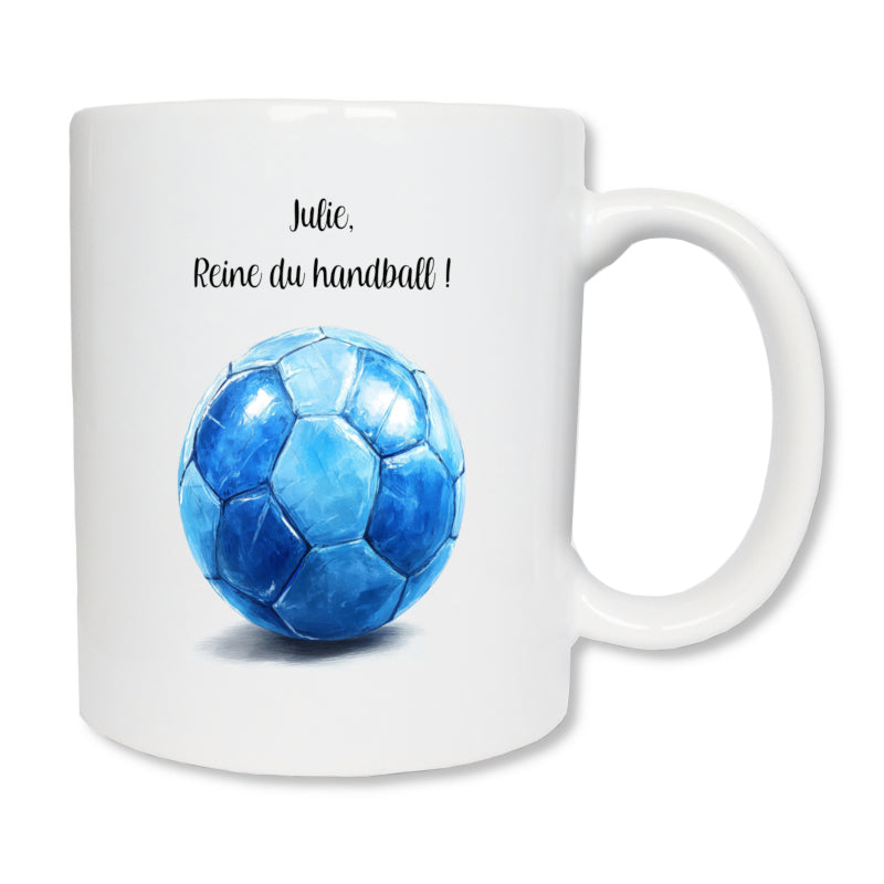 Mug blanc imprimé avec un ballon bleu de handball et un texte