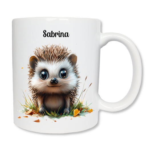 Mug blanc en céramique de 325 ml avec un hérisson et personnalisé avec un prénom.