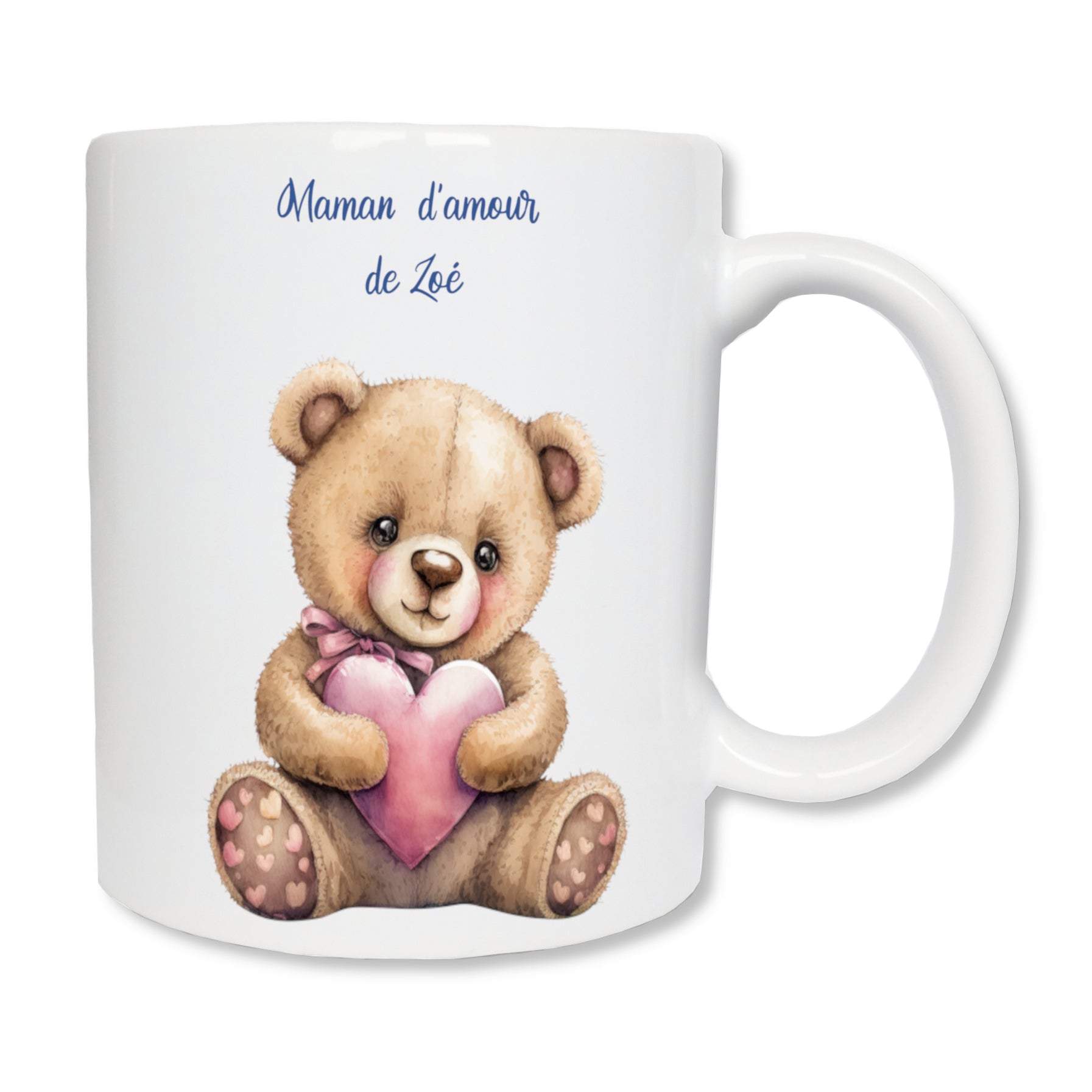 Mug personnalisé en céramique blanc représentant un ours en peluche qui tient un coeur contre lui. En haut il y a un message pour une maman